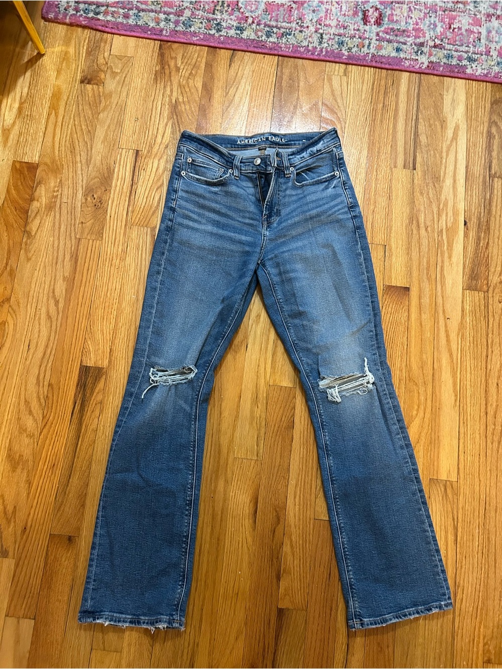 American Eagle Outfitters Blue Flare Jeans with Knee Rips